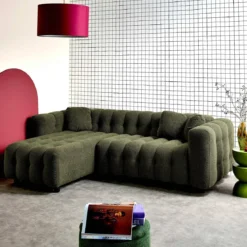 Divano angolare reversibile in tessuto bouclé testurizzato