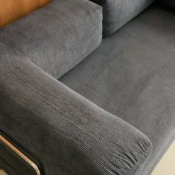 Divano letto futon in velluto a coste e struttura cromata