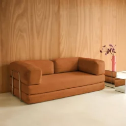 Divano letto futon in velluto a coste e struttura cromata