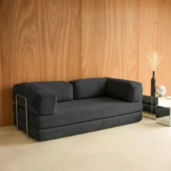 Divano letto futon in velluto a coste e struttura cromata