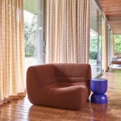 Poltrona angolare in bouclé testurizzato