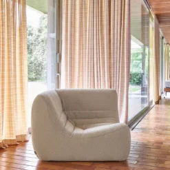 Poltrona angolare in bouclé testurizzato