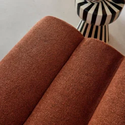 Poltrona bouclé testurizzata