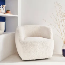 sweeek Poltrona girevole 360º in metallo e bouclé