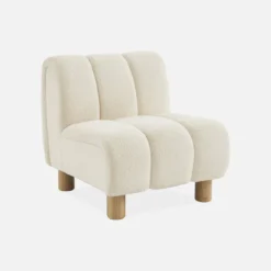 Poltrona relax con gambe rotonde in legno e tessuto bouclé