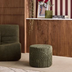 Pouf rotondo in bouclé testurizzato