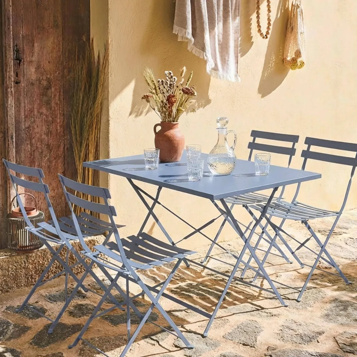 sweeek Set tavolo da giardino pieghevole in acciaio con 4 sedie, 110cm
