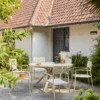 sweeek Set tavolo da giardino rotondo in alluminio e vetro con 6 sedie
