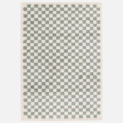 Tappeto a scacchiera di colore azzurro e crema