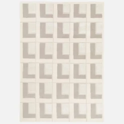 Tappeto da interno con motivi geometrici crema