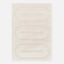 Tappeto da interno con motivi geometrici crema